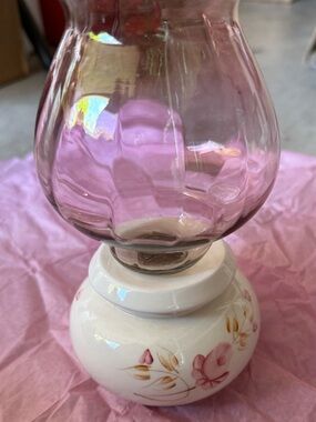 Pink Floral Lasting Products Glass Hurricane Lamp with Rose Colored Votive.